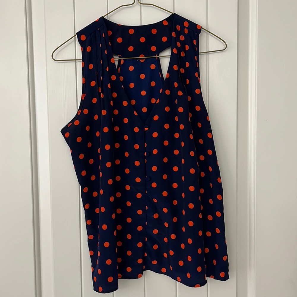 Navy and orange polka dot top